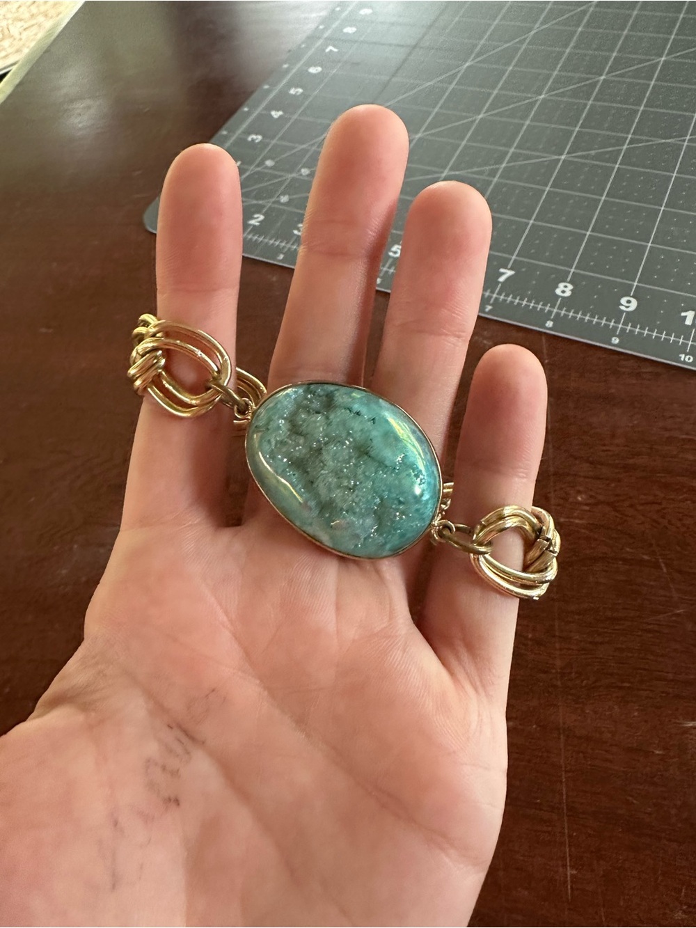 Gold-Tone Bracelet with Turquoise Blue Stone Center